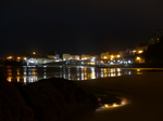FZ026184 Reflection of Tenby lights in beach.jpg